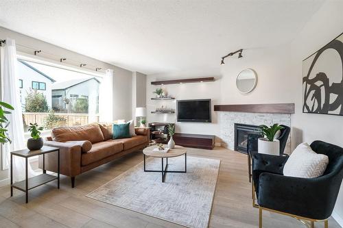 162 Purple Sage Crescent, Winnipeg, MB - Indoor Photo Showing Living Room With Fireplace