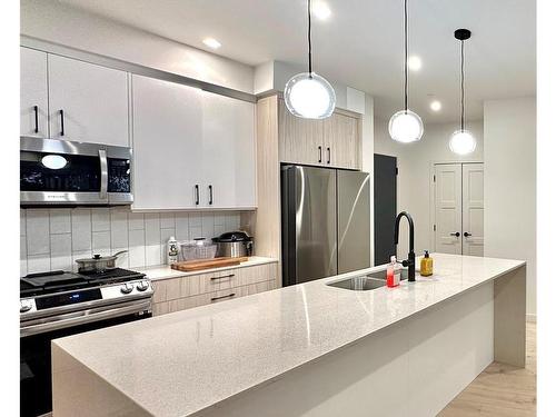 110-958 Pharoah Mews, Langford, BC - Indoor Photo Showing Kitchen With Double Sink With Upgraded Kitchen