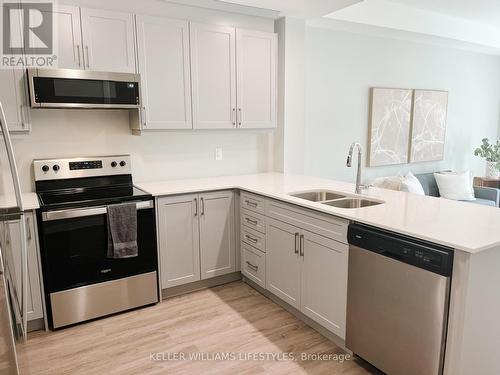 104 - 100 The Promenade Road, Central Elgin (Port Stanley), ON - Indoor Photo Showing Kitchen With Double Sink With Upgraded Kitchen