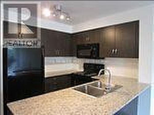 309 - 80 Esther Lorrie Drive, Toronto (West Humber-Clairville), ON - Indoor Photo Showing Kitchen With Double Sink