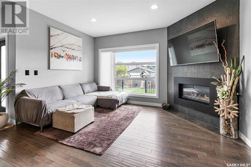 139 Johns Road, Saskatoon, SK - Indoor Photo Showing Living Room With Fireplace