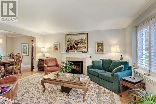 132 Thompson Avenue, Toronto (Stonegate-Queensway), ON - Indoor Photo Showing Living Room With Fireplace