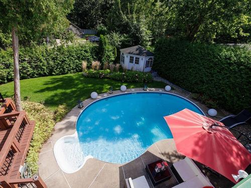 Vue - 61 Av. Cedar, Pointe-Claire, QC - Outdoor With In Ground Pool With Backyard