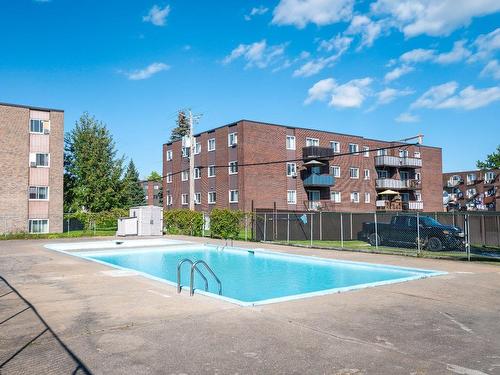 Piscine - 303-2850 Rue Quevillon, Longueuil (Saint-Hubert), QC - Outdoor With In Ground Pool