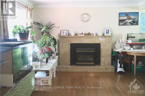 738 Manitou Drive, Ottawa, ON - Indoor Photo Showing Living Room With Fireplace