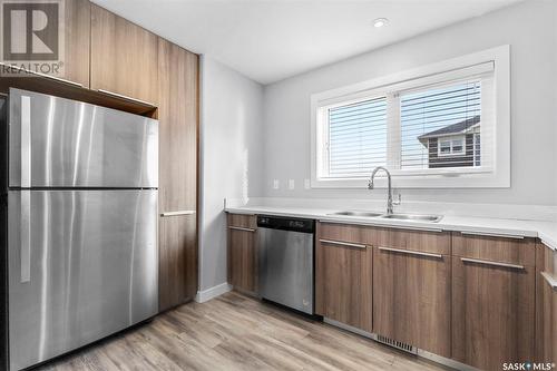 305 315 Kloppenburg Link, Saskatoon, SK - Indoor Photo Showing Kitchen With Double Sink