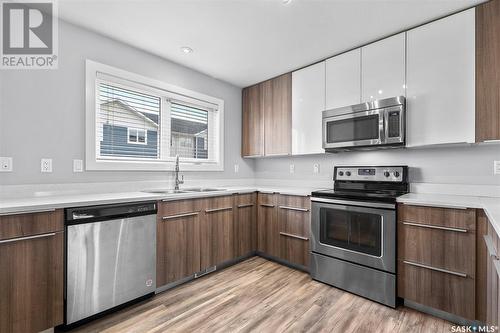 305 315 Kloppenburg Link, Saskatoon, SK - Indoor Photo Showing Kitchen With Double Sink