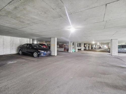 Stationnement - 511-1420 Rue Lucien-Paiement, Laval (Laval-Des-Rapides), QC - Indoor Photo Showing Garage