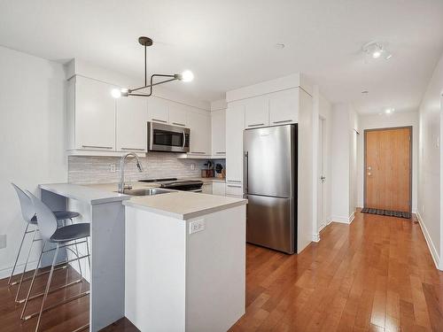 Cuisine - 511-1420 Rue Lucien-Paiement, Laval (Laval-Des-Rapides), QC - Indoor Photo Showing Kitchen With Upgraded Kitchen