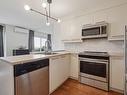 Kitchen - 511-1420 Rue Lucien-Paiement, Laval (Laval-Des-Rapides), QC  - Indoor Photo Showing Kitchen 