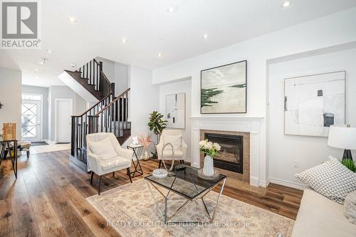 555 Murray Meadows Place, Milton, ON - Indoor Photo Showing Living Room With Fireplace