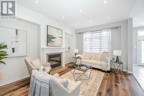 555 Murray Meadows Place, Milton, ON - Indoor Photo Showing Living Room With Fireplace