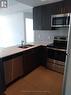 807 - 560 North Service Road, Grimsby, ON  - Indoor Photo Showing Kitchen With Double Sink 