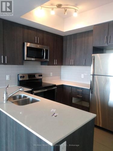 807 - 560 North Service Road, Grimsby, ON - Indoor Photo Showing Kitchen With Double Sink