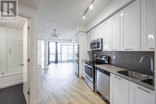 902 - 50 Bruyeres Mews, Toronto (Niagara), ON - Indoor Photo Showing Kitchen With Double Sink With Upgraded Kitchen