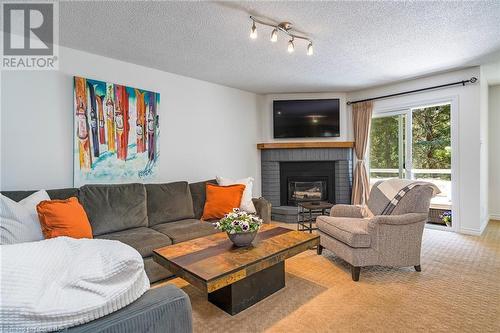 28 Ramblings Way Unit# 42, Collingwood, ON - Indoor Photo Showing Living Room With Fireplace