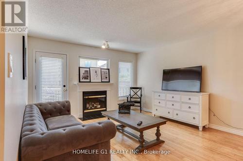 80 - 320 Ambleside Drive, London, ON - Indoor Photo Showing Living Room With Fireplace