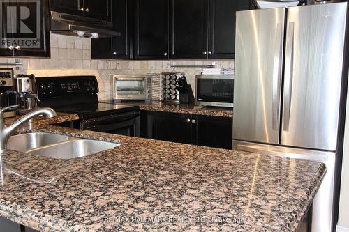 518 - 48 Suncrest Boulevard, Markham, ON - Indoor Photo Showing Kitchen With Double Sink With Upgraded Kitchen