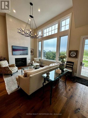 13 - 133 Georgian Bay Lane, Blue Mountains, ON - Indoor Photo Showing Living Room With Fireplace