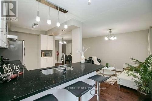 70 - 6950 Tenth Line W, Mississauga, ON - Indoor Photo Showing Kitchen With Double Sink