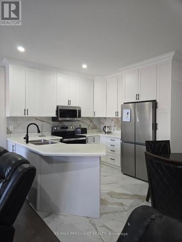 67 Maple Valley Street, Brampton (Bram East), ON - Indoor Photo Showing Kitchen With Double Sink