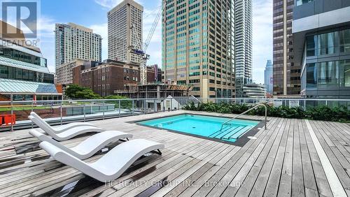 2902 - 1 Yorkville Avenue, Toronto (Annex), ON - Outdoor With In Ground Pool With Deck Patio Veranda With Facade