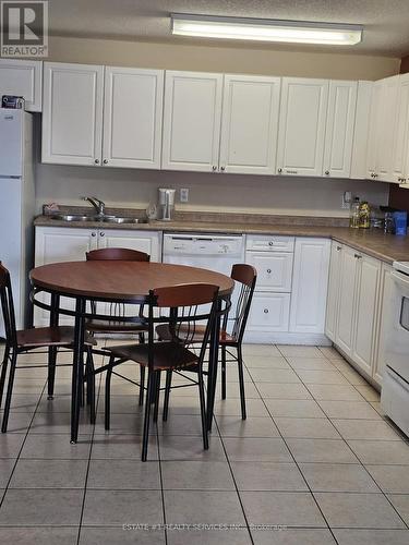 504 - 261 Lester Street, Waterloo, ON - Indoor Photo Showing Kitchen With Double Sink