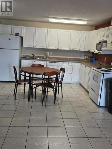 504 - 261 Lester Street, Waterloo, ON - Indoor Photo Showing Kitchen With Double Sink