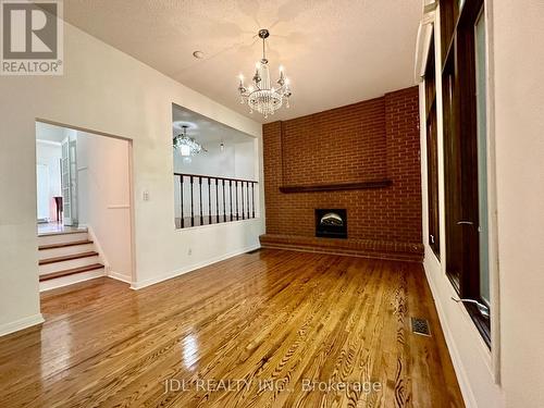 12 - 100 Burrows Hall Boulevard, Toronto (Malvern), ON - Indoor Photo Showing Other Room With Fireplace