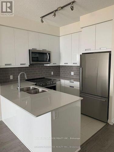 3019 - 35 Watergarden Drive, Mississauga, ON - Indoor Photo Showing Kitchen With Double Sink