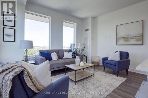 823 - 3200 William Coltson Avenue, Oakville, ON - Indoor Photo Showing Living Room