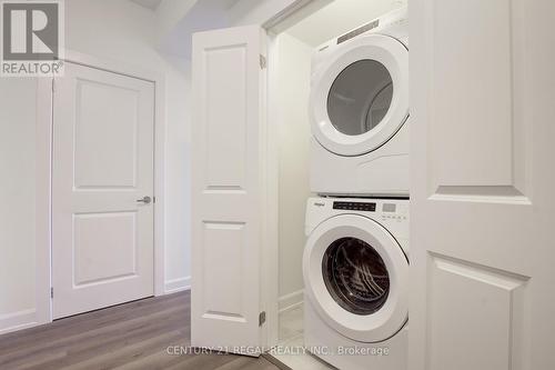 823 - 3200 William Coltson Avenue, Oakville, ON - Indoor Photo Showing Laundry Room