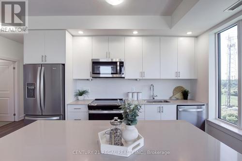 823 - 3200 William Coltson Avenue, Oakville, ON - Indoor Photo Showing Kitchen