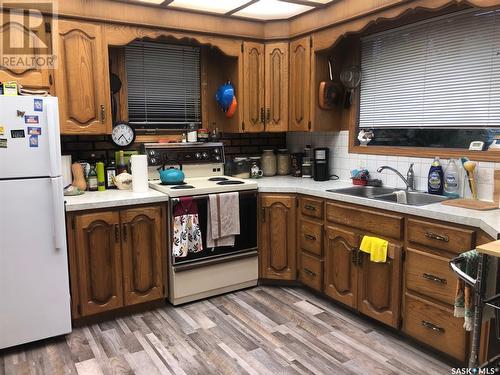 129 3Rd Avenue E, Canora, SK - Indoor Photo Showing Kitchen With Double Sink