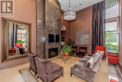 710 - 385 Prince Of Wales Drive, Mississauga (City Centre), ON - Indoor With Fireplace