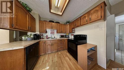 134 J Avenue S, Saskatoon, SK - Indoor Photo Showing Kitchen With Double Sink