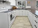 315 3Rd Street W, Wilkie, SK  - Indoor Photo Showing Kitchen With Double Sink 