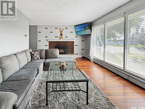 315 3Rd Street W, Wilkie, SK - Indoor Photo Showing Living Room With Fireplace