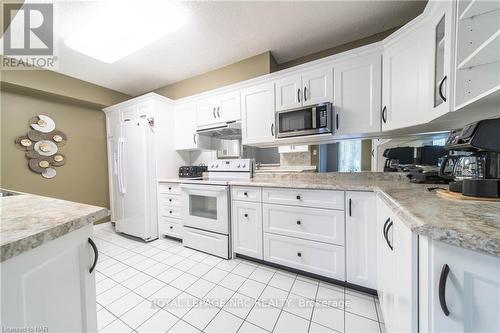 209 - 8111 Forest Glen Drive, Niagara Falls, ON - Indoor Photo Showing Kitchen