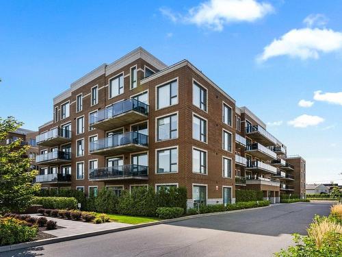 ExtÃ©rieur - 405-4060 Boul. Des Sources, Dollard-Des-Ormeaux, QC - Outdoor With Balcony With Facade