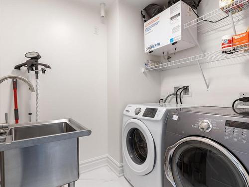 Laundry room - 405-4060 Boul. Des Sources, Dollard-Des-Ormeaux, QC - Indoor Photo Showing Laundry Room