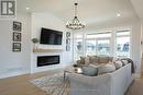 11 Briscoe Crescent, Strathroy-Caradoc (Ne), ON  - Indoor Photo Showing Living Room With Fireplace 