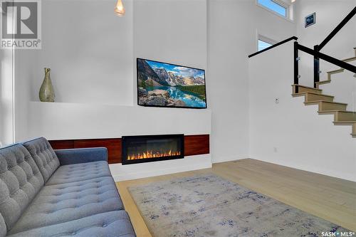 3410 Greenbrook Road, Regina, SK - Indoor Photo Showing Living Room With Fireplace