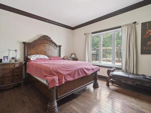 Master bedroom - 113  - 113A Rue Luc, Saint-Colomban, QC - Indoor Photo Showing Bedroom