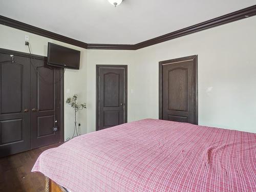 Master bedroom - 113  - 113A Rue Luc, Saint-Colomban, QC - Indoor Photo Showing Bedroom