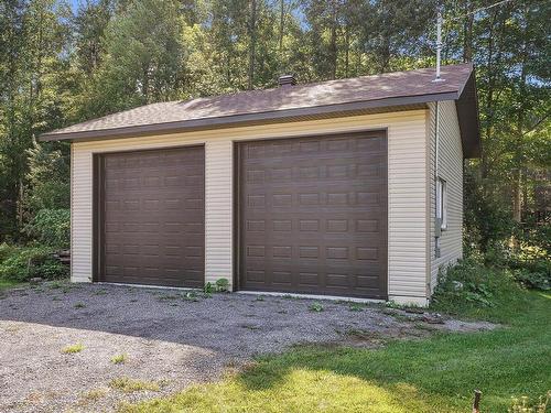 Garage - 113  - 113A Rue Luc, Saint-Colomban, QC - Outdoor With Exterior