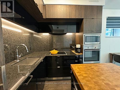 515 - 55 Merchants Wharf, Toronto (Waterfront Communities), ON - Indoor Photo Showing Kitchen