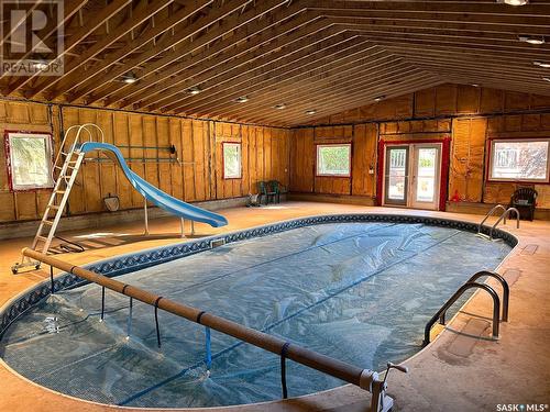 3 Hummingbird Bay, White City, SK - Indoor Photo Showing Other Room With In Ground Pool