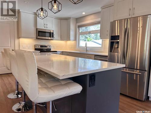 3 Hummingbird Bay, White City, SK - Indoor Photo Showing Kitchen With Stainless Steel Kitchen With Upgraded Kitchen