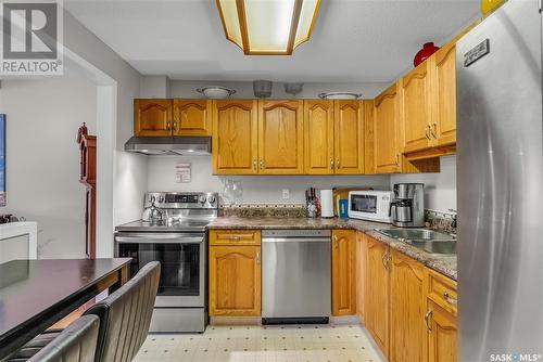 210 217A Cree Place, Saskatoon, SK - Indoor Photo Showing Kitchen With Double Sink